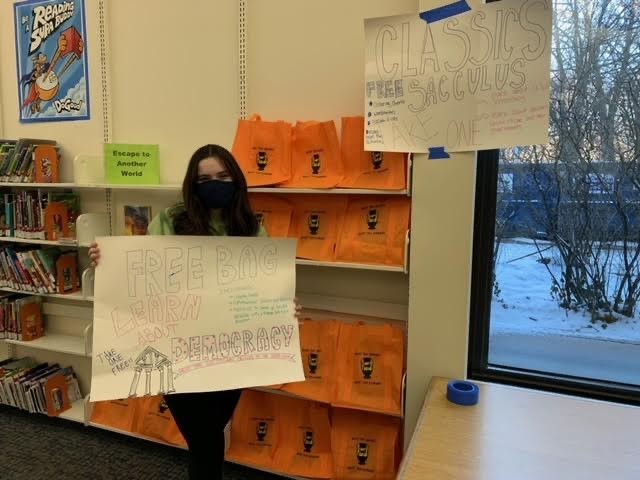 Figure 3. Lauren Tapper, a sophomore at the University of Chicago Lab School, with her Classics Sacculus at the Sulzer Regional Library in Chicago. Photo by Carolyn Bronstein.