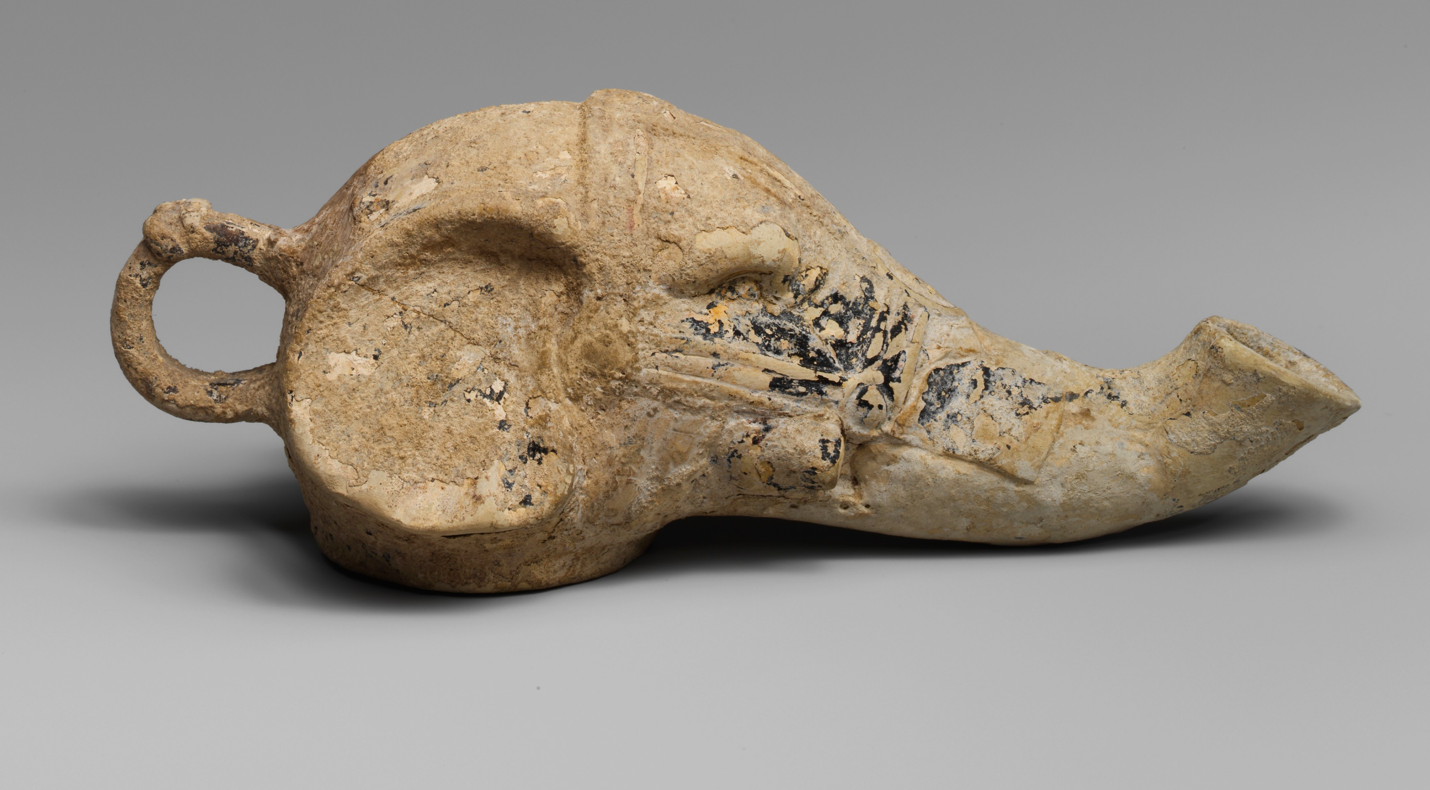 Figure 5: Terracotta oil lamp in the shape of an elephant’s head, 3rdC BCE, from Sicily now at the Met (Image in the Public Domain via the Metropolitan Museum of Art, NYC). 