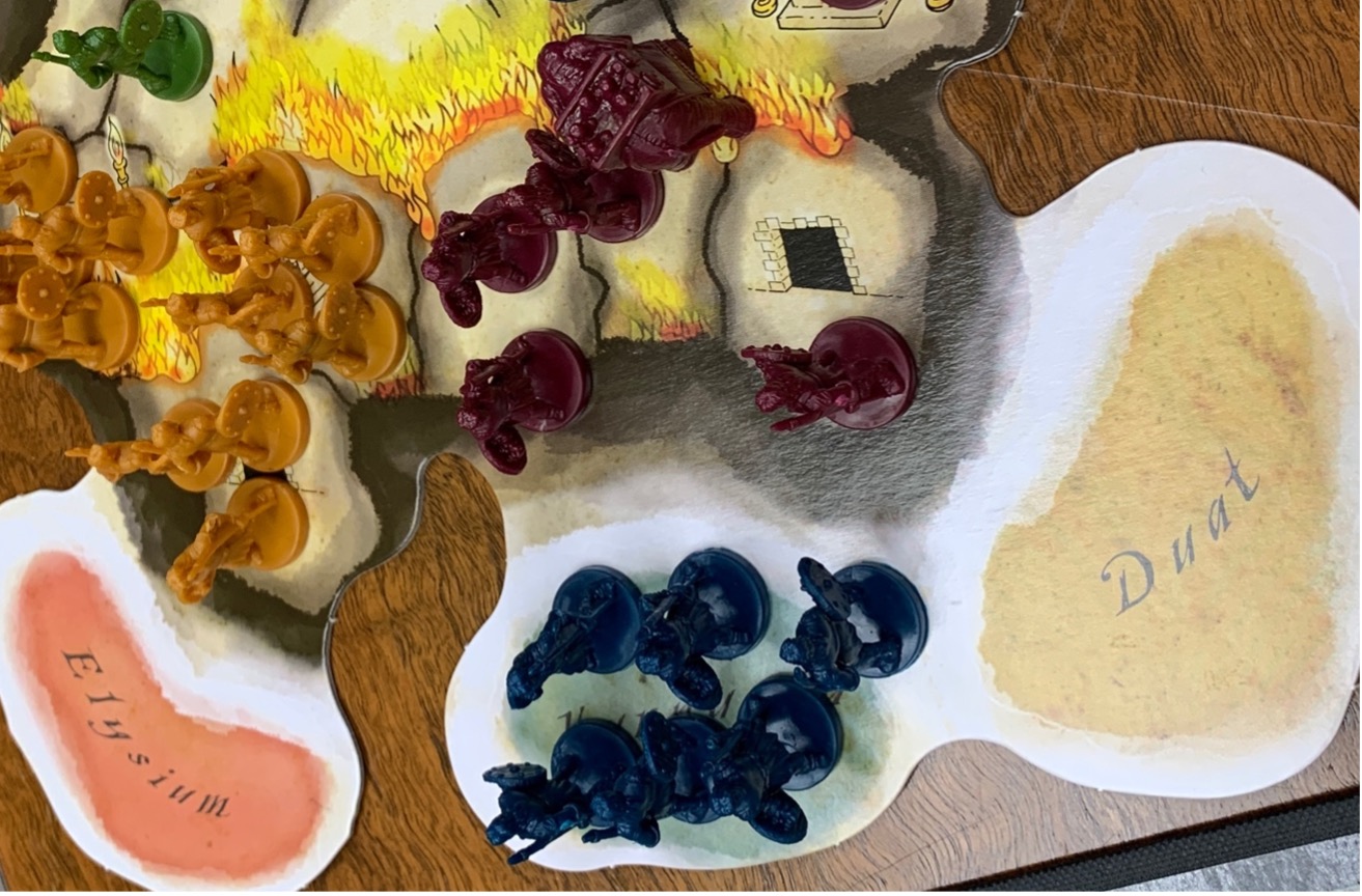 Another section of a game board, drawn as a map, with multicolored tokens on it.